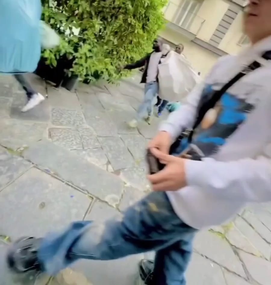 Chaos in Italy: Looters flee police with sacks of stolen goods