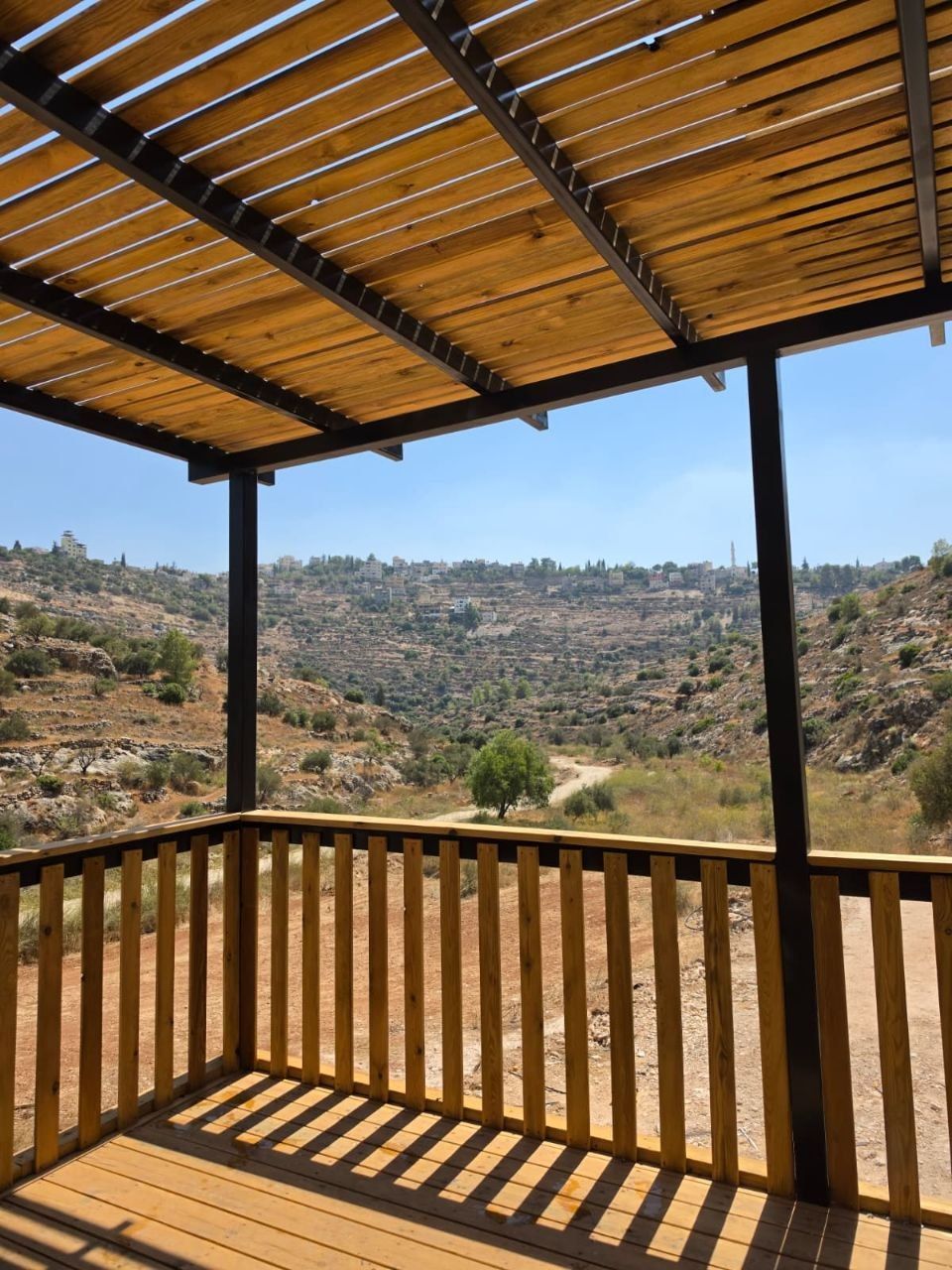 The wooden deck built beside the restored pool on the Heroes' Promenade near Sdeh Efraim