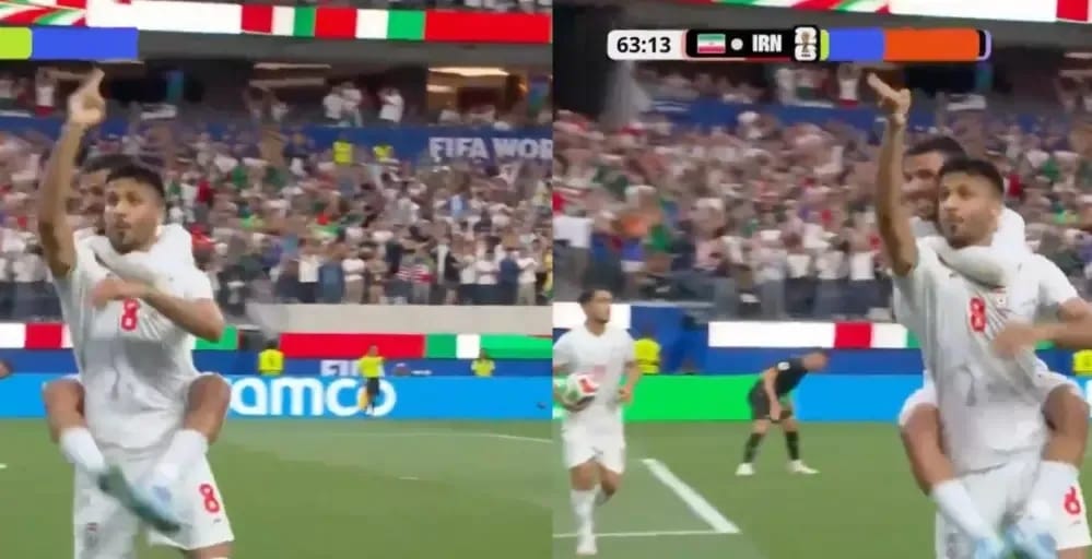 Iranian soccer player points a gun at the crowd