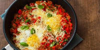 A recipe for a dairy and indulgent shakshuka made in the oven