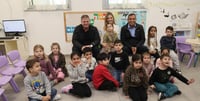 Education Minister Kisch and a Sderot class ready to learn.