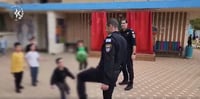 Israeli Police and Sderot schoolchildren have some fun after months of tension.