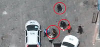 Hamas terrorists operating near UN vehicles and personnel.