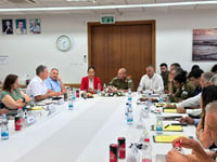 IDF Rear Command commander Maj.-Gen. Rafi Milo meets with local leaders.