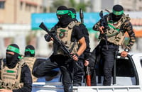 Masked members of the al-Qassam Brigades, the military wing of Hamas