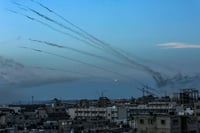 Hamas fires a large number of rockets towards Israel in the city of Rafah in the southern Gaza Strip, October 7, 2023.