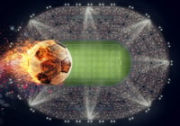 Soccer ball with flame of fire over a stadium