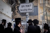 Haredim near recruiting office