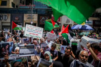 Palestinians f protest following the killing of Hamas leader Ismail Haniyeh in Iran, in the West Bank city of Hebron, August 3, 2024.