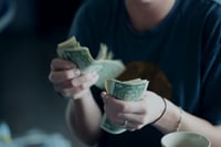 Woman counting money