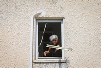  A damaged apartment building following a missile attack from Lebanon, in Acre, northern Israel, August 25, 2024. 