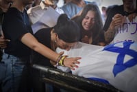 Families attend the funeral of slain hostage Eden Yerushalmi at a cemetery in Petach Tikva, September 1, 2024