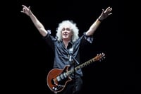 Brian May from Queen performs with Kerry Elils 