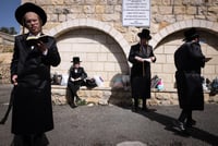 Ultra orthodox Jews of the Chassidic dynasty of Belz daven in Meron