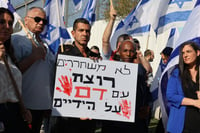 Israelis protest outside Maasiyahu prison, central Israel, the possible release of terrorist who tortured and murdered Israeli soldier Moshe Tamam nearly 40 years ago. May 31, 2023