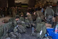 IDF soldiers suiting up before setting off for Lebanon.