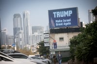 A large billboard posted in Tel Aviv, in support of Republican presidential nominee and former US president Donald Trump just days ahead of the US general elections, November 3, 2024