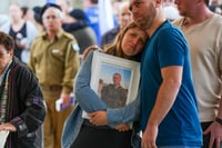 Family and friends of Israeli soldier First sergeant Yair Hananya attend his funeral in Mitzpe Netofa, northern Israel, on November 3, 2024. He fell in battle in the Gaza Strip