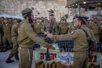 Israeli soldiers from Netzah Yehuda at a swearing-in ceremony at the Western Wall in Jerusalem's Old City, on July 10, 2024. 