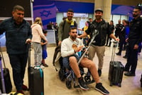 Maccabi Tel Aviv fans who flew on El Al rescue flight from Amsterdam arrive at Ben Gurion international airport, near Tel Aviv, November 8, 2024