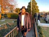 Rabbi Tzvi Kogan.