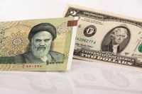 Iranian and American currency.