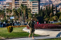 Syrian rebels and citizens celebrate after taking over Damascus, the Capital of Syria