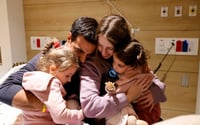 Doron Katz Asher and her two young daughters Raz, 4, and Aviv, 2, are reunited with husband and father Yoni, on November 25, 2023