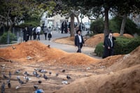 Ultra orthodox jews walking in the street in the Ultra orthodox town of Bnei Brak