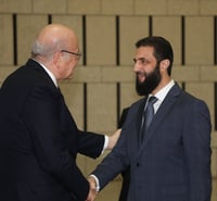 Ahmed al-Sharaa with Lebanese Prime Minister Najib Mikati