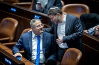 Itamar Ben Gvir and Bezalel Smotrich attend a plenum session on forming the government, in the Israeli parliament