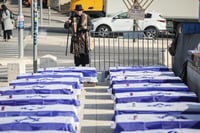 Empty coffins with the Israeli flag seen as part of a protest against the ceasefire between Israel and Hamas, outside PM Netanyahu's office in Jerusalem. January 16, 2025