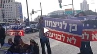 Protesting hostage deal at the entrance to Jerusalem