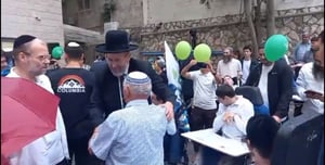 Rabbi Lau at Simchat Beit HaShoeva at the place