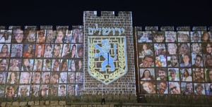 Watch: The Walls of Jerusalem were Lit Up with the Pictures of the Abductees