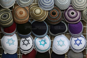 Almost 70% of British Jews less likely to wear things like kipahs due to antisemitism. Kipahs for sale in Jerusalem.