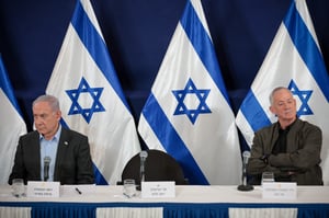 Their blocs are polling about even, with Arab parties holding the balance. Netanyahu and Gantz.