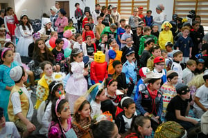 Schoolchildren dressed up for Purim.
