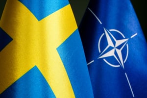 Swedish and NATO flags.