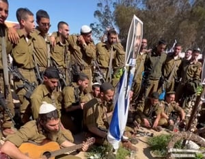 Praying in song in memory of the fallen. Netzach Yehudah soldiers.