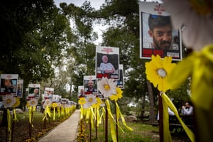 Pictures of Israeli hostages held by Hamas terrorists in the Gaza Strip are displayed at a forest near Jerusalem, March 17, 2024.