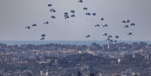 Humanitarian aid parachuted into Gaza