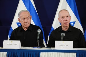 Israeli prime minister Binyamin Netanyahu, Minister of Defense Yoav Galant, and head of the National Unity party Benny Gantz (not seen)  hold a joint press conference at the Ministry of Defense, in Tel Aviv. October 28, 2023. 