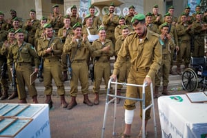 Wounded IDF soldier participating in his training graduation ceremony