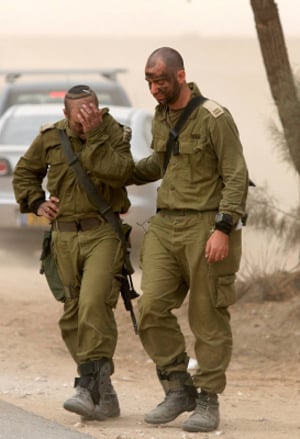 Israeli soldiers return from an army operation in the Gaza Strip on the Israel- Gaza Border,