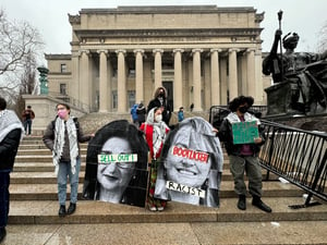 January 19, 2024: Pro-Palestinian protesters holding up images of Columbia University president Minouche Shafik and Barnard College president Laura A. Rosenbury at protest on campus