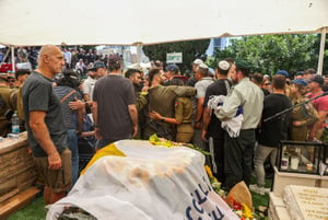 Family and friends of Israeli soldier Sergeant first class (res.) Omer Smadga attend his funeral at the military cemetery in Netanya on June 21, 2024. He was killed in combat in the Gaza Strip. Photo by Flash90