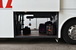 Illustrative: Bus trunk with luggage