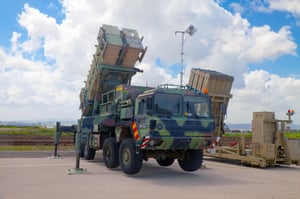  Patriot Guided Missile System and Iron Dome launcher at the exhibition 