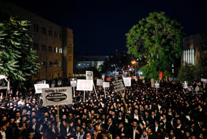 Thousands of ultra-Orthodox jews attend a rally against the recruitment of Ultra orthodox Jews to the IDF, in Jerusalem, June 30, 2024. 